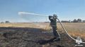 В Элисте потушили степной пожар в районе храма Сякюсн-Сюме